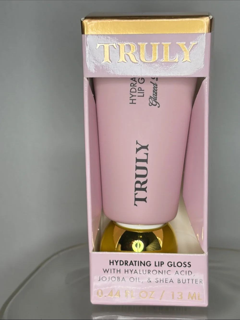 TRULY Hydrating Lip Gloss in glazed donut, mauve pink semi sheer